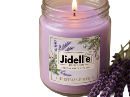 Lavender-scented candle in a glass jar with Christmas-themed label.